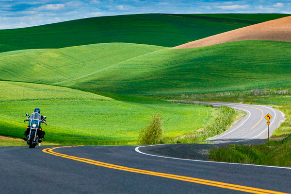 Photograph Patrick Bennett A Lone Motorcyclist On The Twisties Of The Palouse on One Eyeland