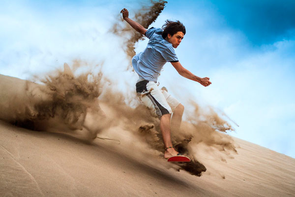 Photograph Patrick Bennett Sandboarder In Argentina on One Eyeland