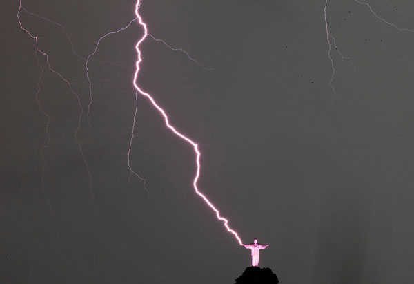 Photograph Antonio Lacerda Lightning Strikes In The Hands Of Christ on One Eyeland