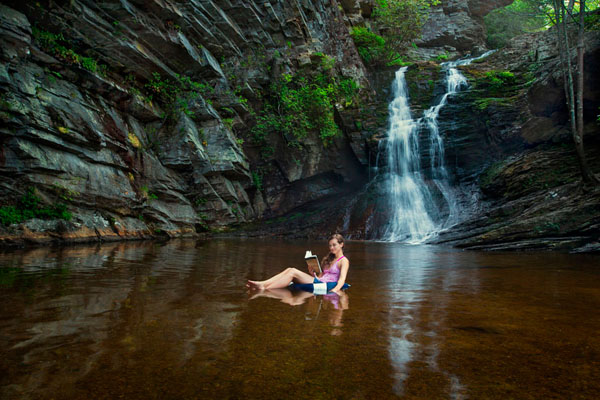 Photograph Chip Henderson Reading At Waterfall on One Eyeland
