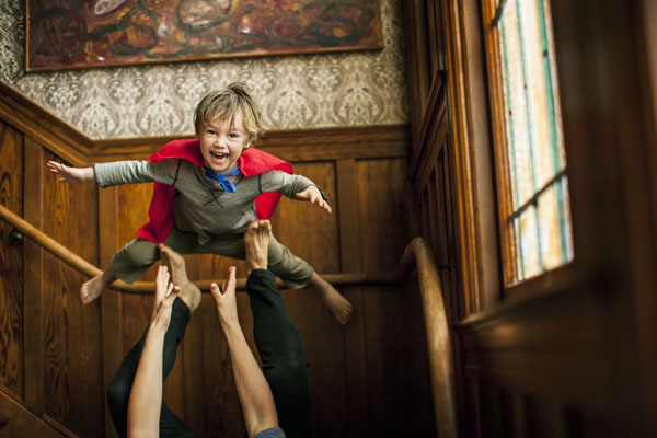 Photograph Jim Erickson Child Being Thrown Into The Air on One Eyeland
