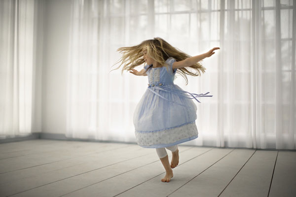 Photograph Jim Erickson Little Girl Joyfully Spinning on One Eyeland