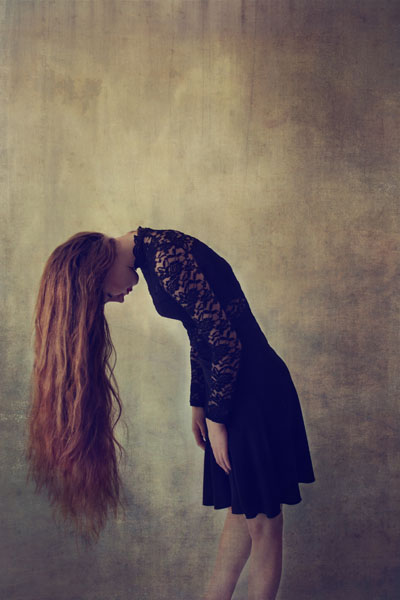 Photograph Michele Taras Bent Over on One Eyeland
