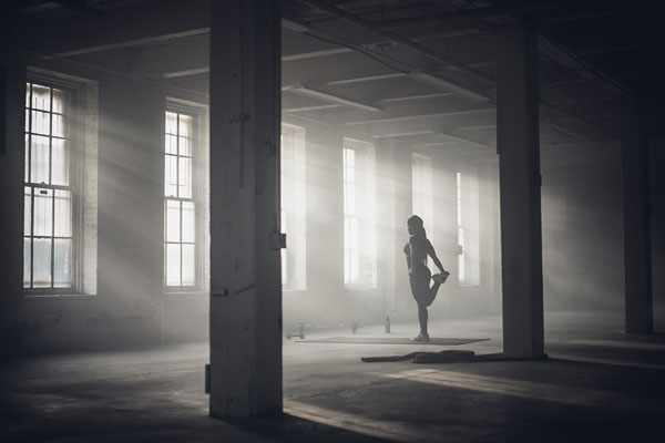 Photograph Fedele Studio Woman Stretching Before Workout on One Eyeland