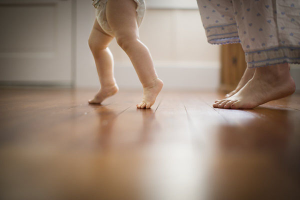 Photograph Jim Erickson Legs Of A Baby And A Woman on One Eyeland