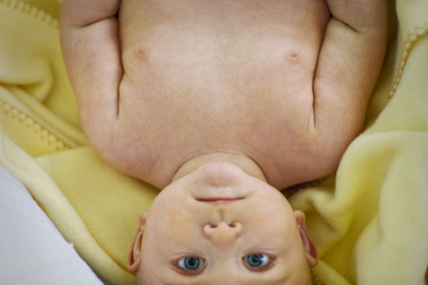 Photograph Jim Erickson Portrait Of A Baby Lying Down on One Eyeland