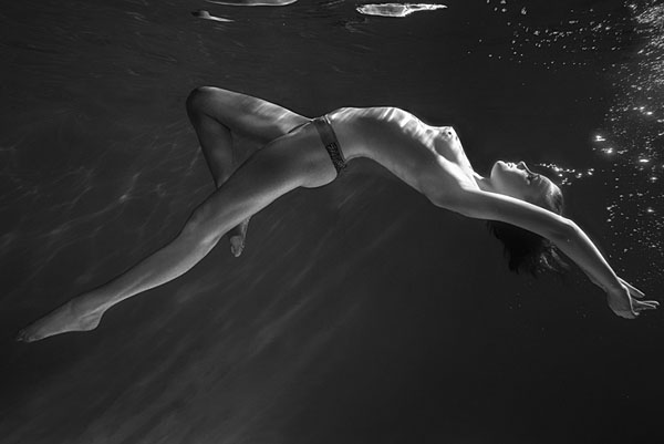 Photograph Hartono Hosea Dancing Underwater on One Eyeland