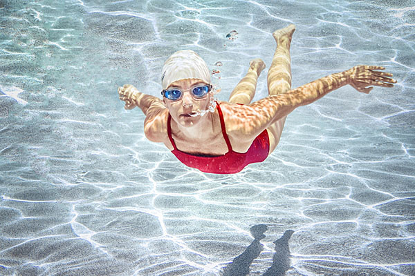 Photograph Jim Vecchione Woman Swimming In Red Suit on One Eyeland