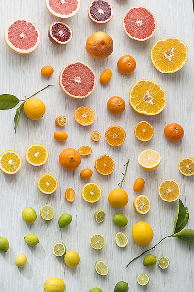 Photograph Ann Cutting Fresh Fruit on One Eyeland