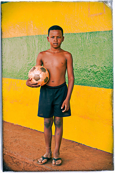 Photograph Raf Willems Boy Posing With Soccer Ball on One Eyeland