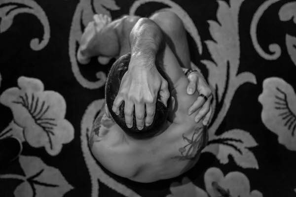 Photograph Daniel Oprea Hand On Head on One Eyeland