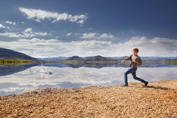 Photograph Chris Frazer Smith Skimming Stones on One Eyeland