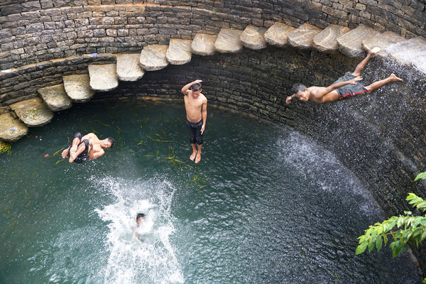 Photograph Sumesh Senan Taking A Dip In The Well on One Eyeland