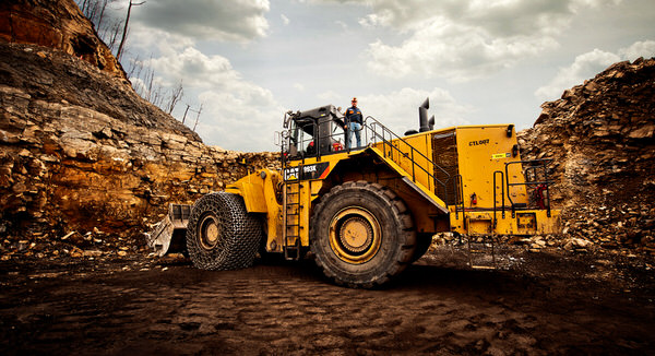 Photograph Robb Scharetg Coal Miner And His Caterpillar on One Eyeland