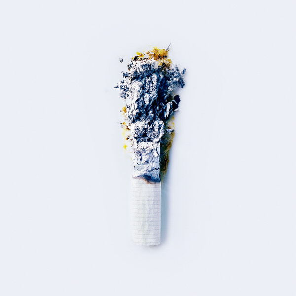 Photograph Dom Mowbray Cigarette Ash on One Eyeland