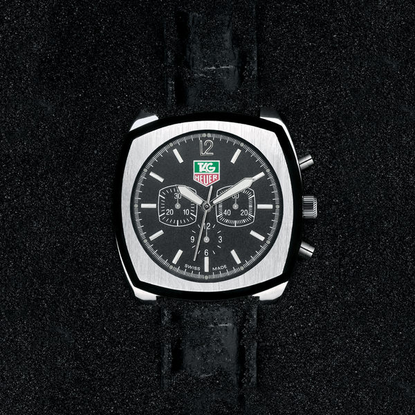 Photograph Dom Mowbray Tag Heuer In Black Sand on One Eyeland