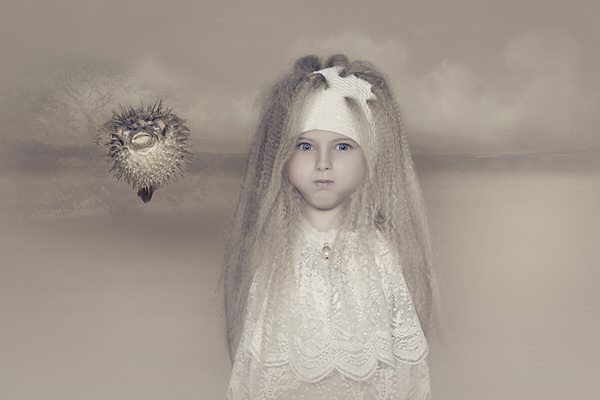 Photograph Carola Kayen Mouthaan Fun With My Blowfish on One Eyeland