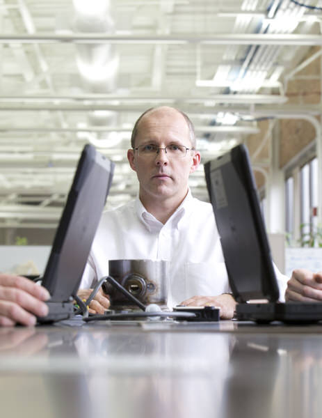 Photograph Andy Goodwin Laptop Exec on One Eyeland