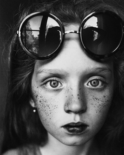 Photograph Uliana Kharinova Round Glasses on One Eyeland
