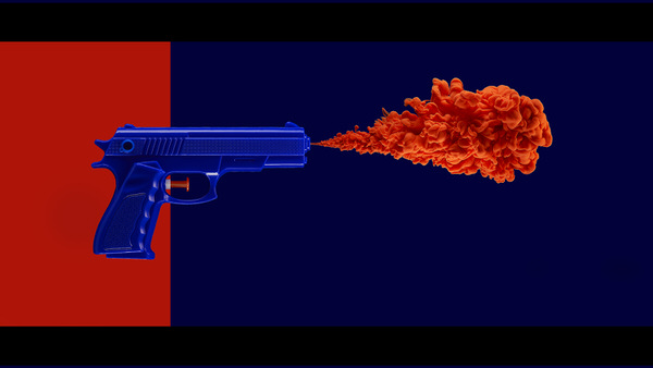 Photograph Graham Tooby Blue And Orange Water Pistol on One Eyeland