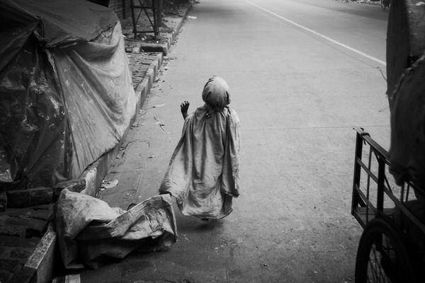 Photograph Christopher Tovo Street Beggar on One Eyeland