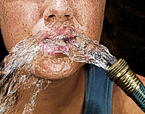 Photograph Dennis Murphy Summer Water Hose on One Eyeland