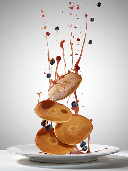 Photograph Piotr Gregorczyk Flying Food Blinis And Blueberry Compote on One Eyeland