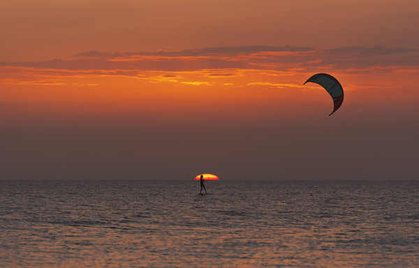 Photograph Ben Welsh Sunset Kitesurfing on One Eyeland