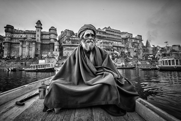 Photograph Saurabh Sirohiya Holy Man In Boat At Varanasi on One Eyeland