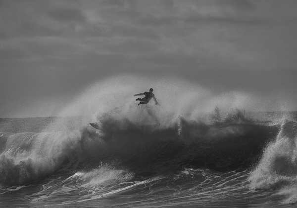 Photograph Steve Turner Surfer In Air on One Eyeland