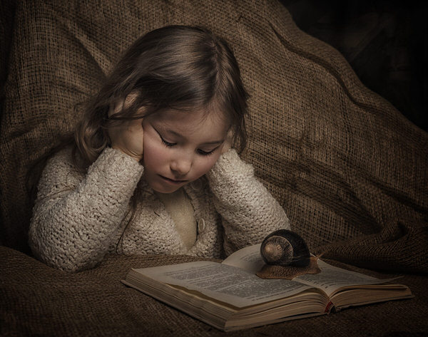 Photograph Natalia Kholodova Reading on One Eyeland