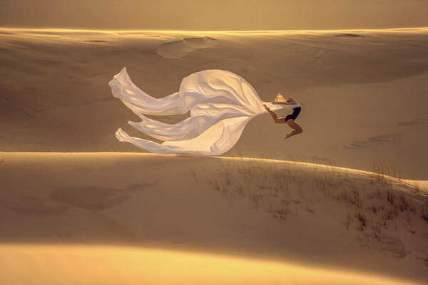 Photograph Junior Luz Flying Around on One Eyeland