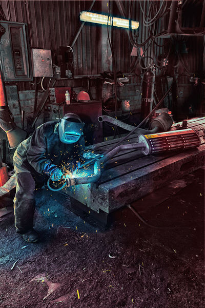 Photograph Stepan Grinchuk Welding Works In The Garage on One Eyeland