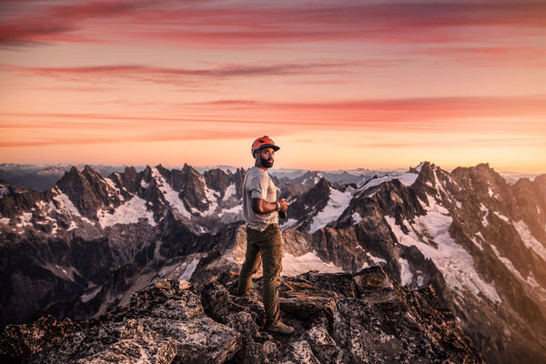 Photograph Mac Holt Summiting Luna Peak on One Eyeland