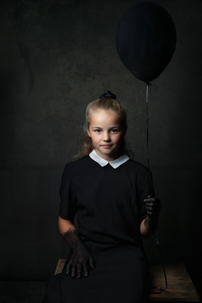 Photograph Marian Korte Black Hands on One Eyeland