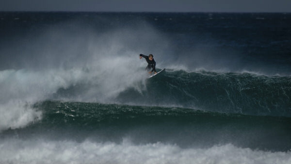 Photograph Steve Turner Surfer In Wind on One Eyeland
