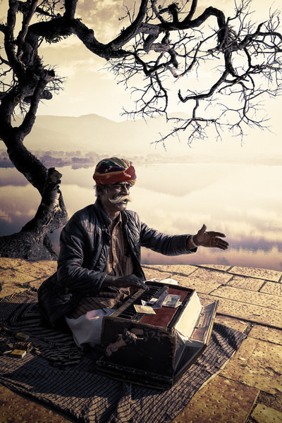 Photograph Cooltango Oonhateparuk Street Musician on One Eyeland
