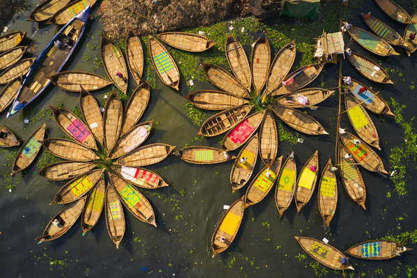 Photograph Azim Khan Ronnie Boats Of Flower on One Eyeland