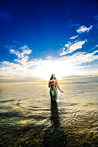 Photograph Hiroky Ash Mermaid Standing In The Morning Sun on One Eyeland
