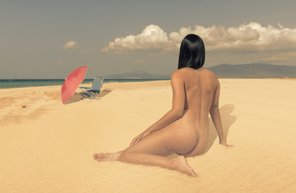 Photograph Ben Welsh Woman Sunbathing on One Eyeland