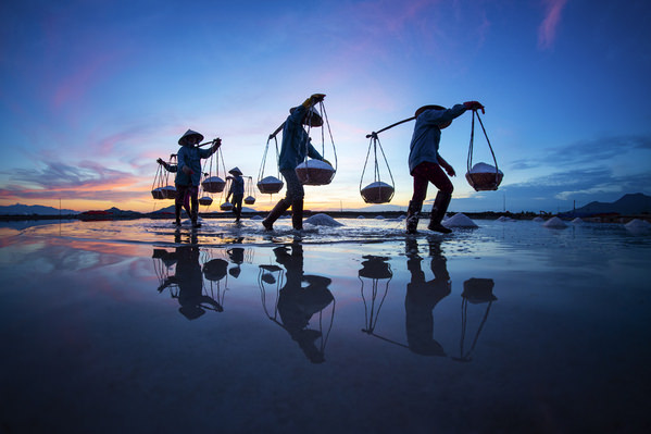 Photograph Do Trong Danh Carry Salt on One Eyeland