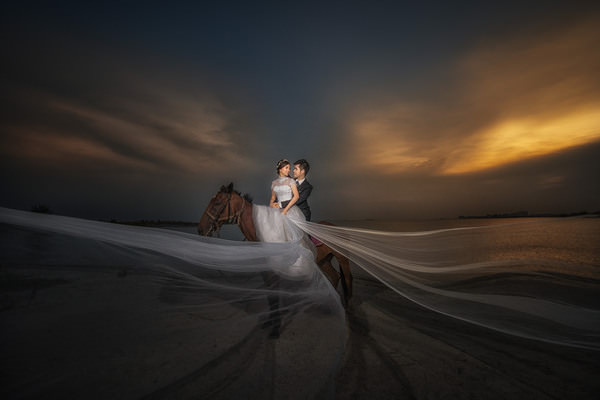 Photograph Pore Ooi Couple Together on One Eyeland