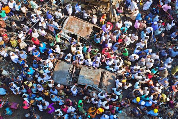 Photograph Pinu Rahman Crowd Valley After Death on One Eyeland