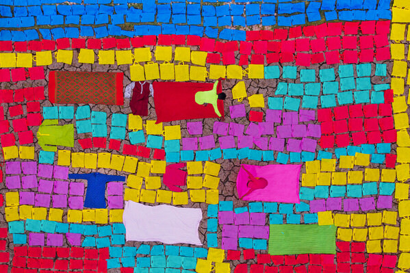 Photograph Sujon Adikary Laundry Drying Field on One Eyeland