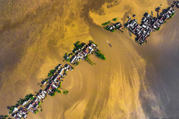 Photograph Sujon Adikary Floating Houses on One Eyeland
