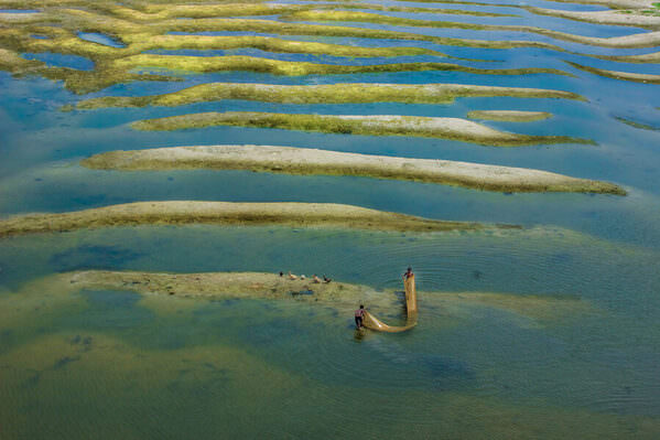 Photograph Sujon Adikary River And Life on One Eyeland