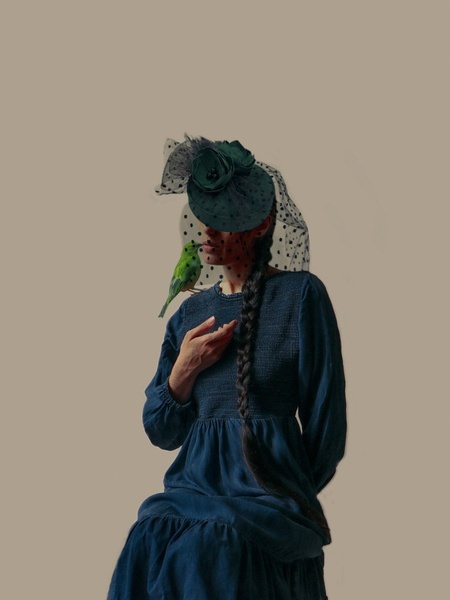 Photograph Vida Khani Lady Kissing A Bird on One Eyeland