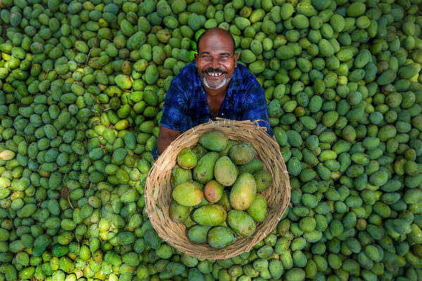 Photograph Sujon Adikary Mango Seller on One Eyeland