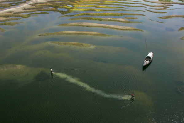 Photograph Sujon Adikary Boat Triangle on One Eyeland