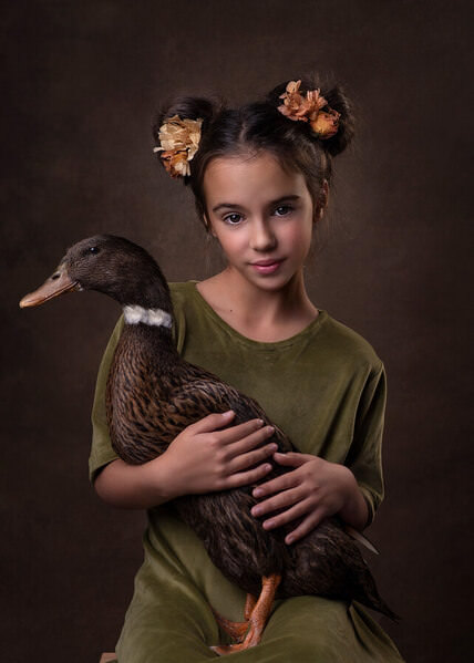 Photograph Daniela Rodriguez A Girl And Her Duck on One Eyeland